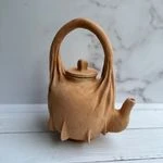 لوگوی آموزشگاه سفالگری کافه سفال لاجوردین